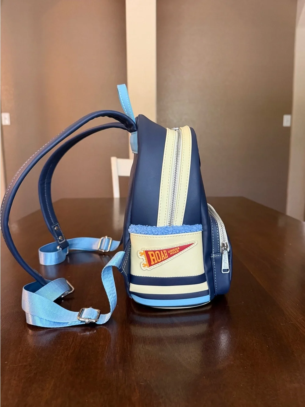 Loungefly Disney Parks Monsters University Varsity Jacket Mini Backpack